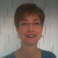 Charlene Spangler, Cap-Om
