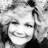 DEBRA ENOS