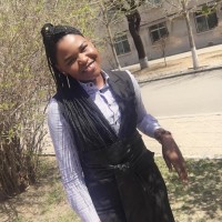 Ann Move Oguti, Ph.D.