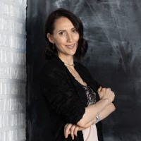 Olga Garland, Mba