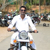R J Ashik