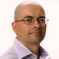 Carlos E. Ospina