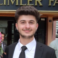 Ali T.