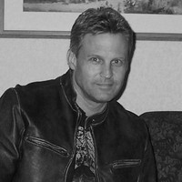 Kent E. Olson