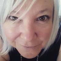 Kathi J Moore