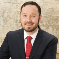 Dmitriy Veligurov, Esq.