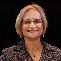Piroozi Desai-Keane Oam, Jp