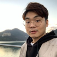 游輝震