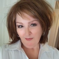 SUSAN SUTTLE