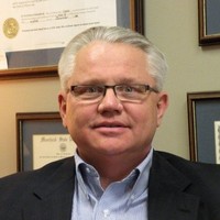 Mark E Larson