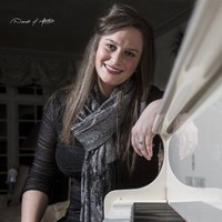 Ashley E. Hanke