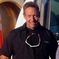 Mark J.
