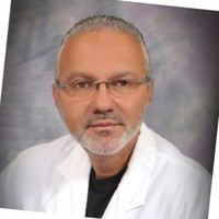 Joseph Ravid, MD, FAAFP.