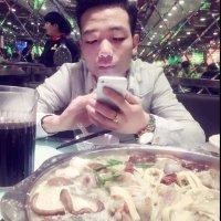 束二俊