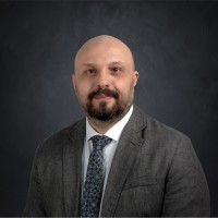 Mohamed Fouad Hrmd, Auc