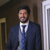NAVIN M