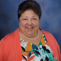 Lupe Santos, Mba