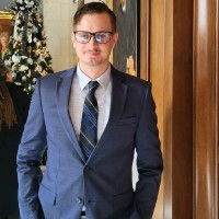 Andrew Beason, CP, SCCP