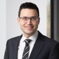 Spyridon (Spiros) Klonizakis, Acca