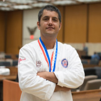Carlos E Ramirez
