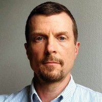 Mark L. Thompson