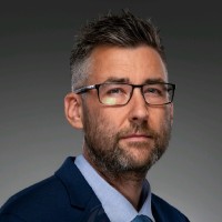 Adam B.
