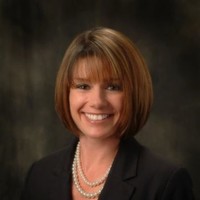 Kim M. Johnson, Cpia, Ais