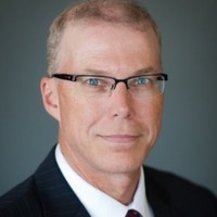 Mark L. Thompson