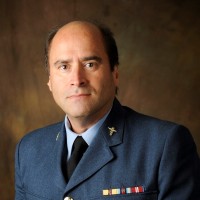 Gus Cabré, MBBS FRCS DRCOG DAvMed RNZAF
