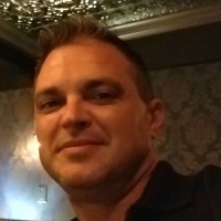 Tim Hughes