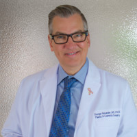 George Alexander, MD, FACS, FAACS, FASLM