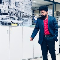 Karthik B.