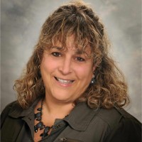 Shari Lombardoni, Mba