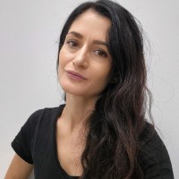 CORINA M.