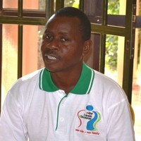 JOHN AMISI