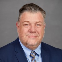 Kenneth Reed, ARM-P, AIC