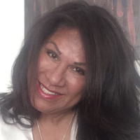 Corrine J Omberg