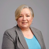 Christine Abbott, Mha