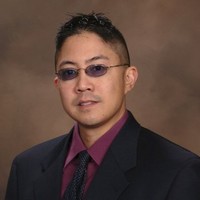Mark  A. Tan