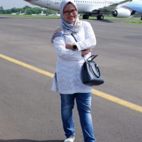 Khina Januar R, S.Ikom., M.M., M.Ikom