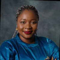 'Liza Babatunde Akintibubo, ACIM