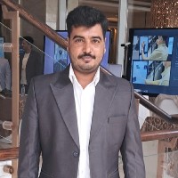 Suresh K K