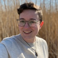 Em Barber (They/Them)