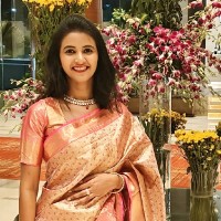 Meghna K