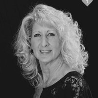 Christine M. Grewe-Broker Officer