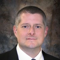Johnny L. Tharp
