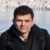Евгений Мигачев