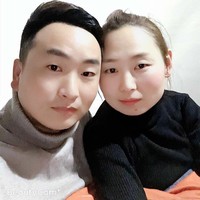 李默然