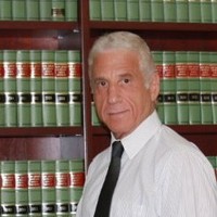 Larry E. Holtz