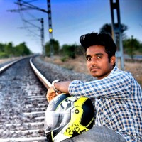Vignesh T